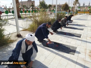 مراسم غبارروبی و عطرافشانی مزار شهدای گمنام با حضور اساتید و کارکنان آموزشکده زابل 4